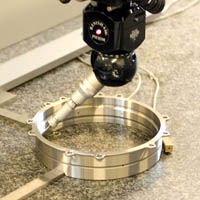 bearing being measures with Mitutoyo Strato CNC measuring machine